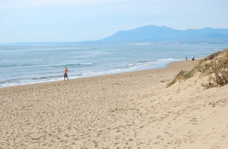 walking along the beach in december elviria marbella