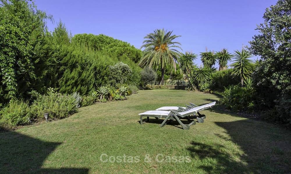 Cozy semi-detached villa for sale on first line golf in Marbella West 14107
