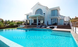 Distressed sale - Modern style villa for sale in a gated golf resort between Marbella, Benahavis and Estepona 1