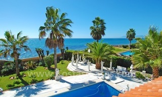 First line beach villa with 2 guest houses for sale in East Marbella 1