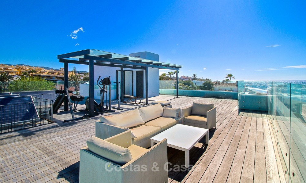 Modern beachfront villa for sale in Marbella with breathtaking sea views 1160