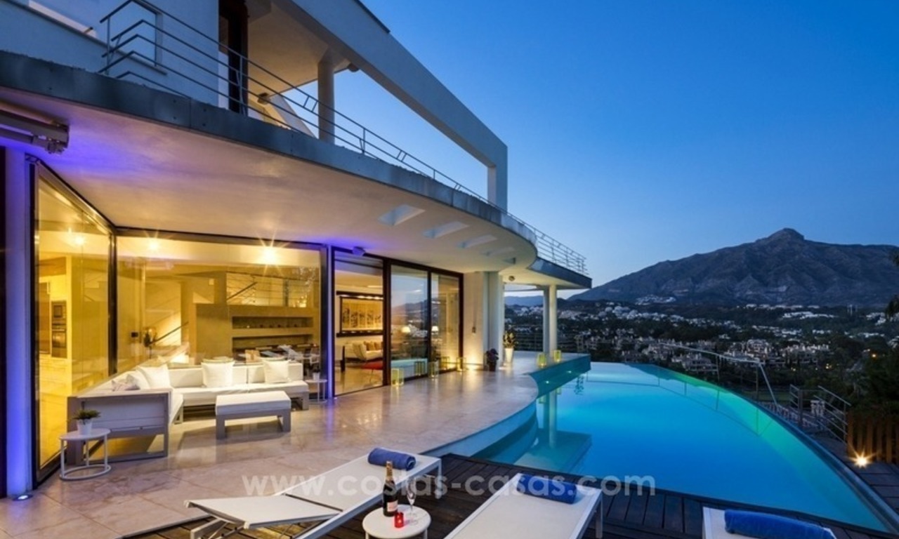 For Sale in Nueva Andalucia, Marbella: Designer Villa with panoramic golf, mountain and sea views 0