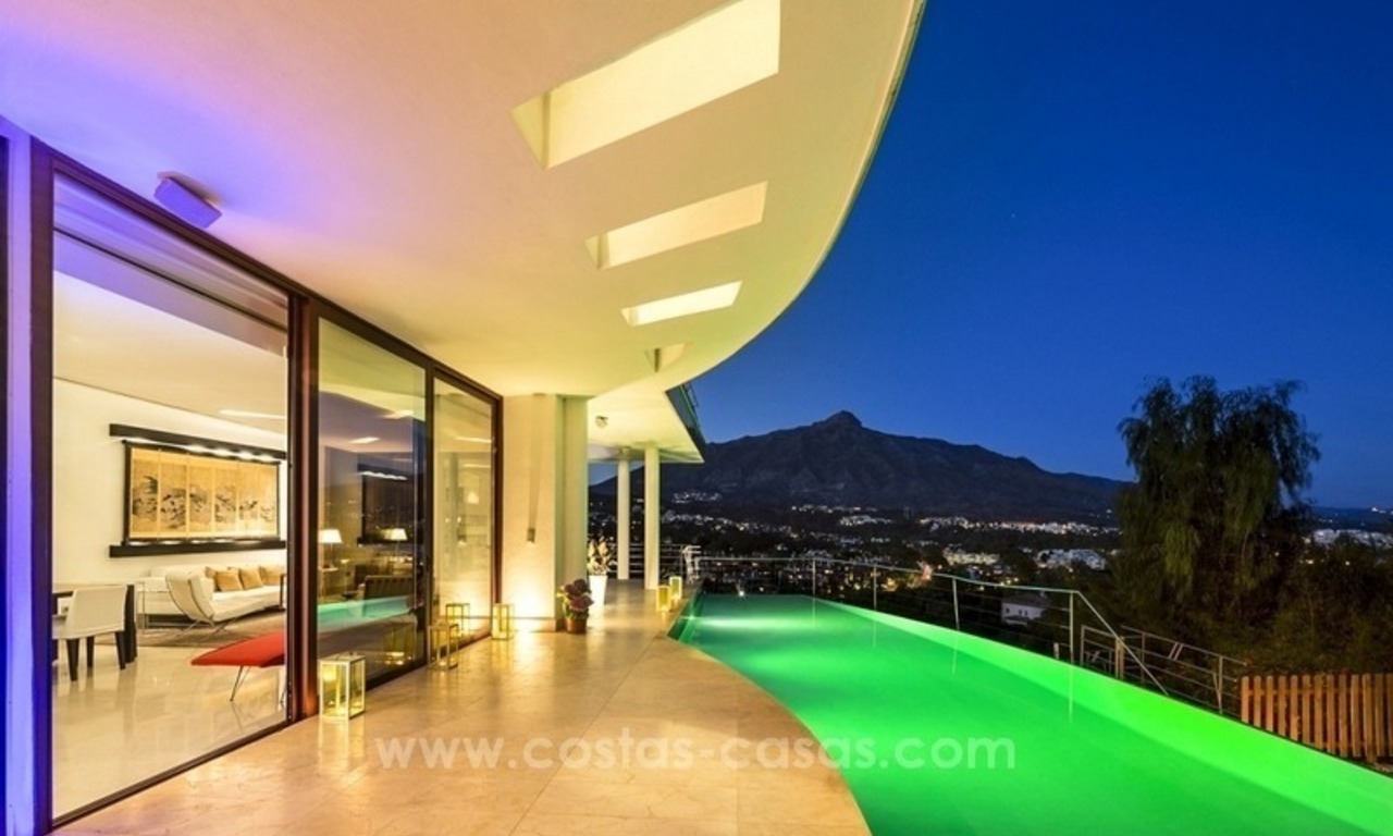 For Sale in Nueva Andalucia, Marbella: Designer Villa with panoramic golf, mountain and sea views 13