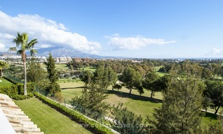 Front line golf, modern style villa for sale in Marbella - Benahavis with spectacular views to the sea, golf and mountains 1
