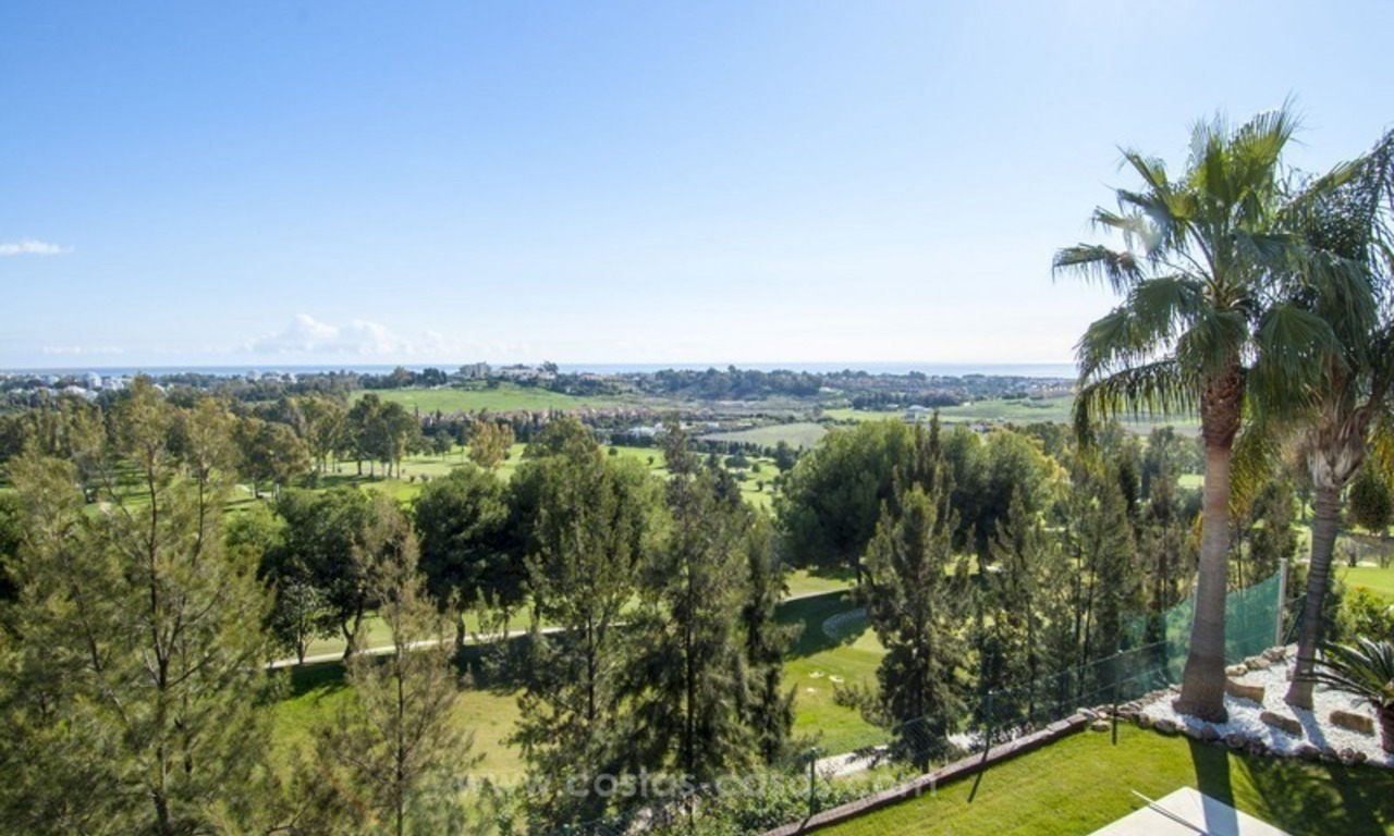 Front line golf, modern style villa for sale in Marbella - Benahavis with spectacular views to the sea, golf and mountains 4
