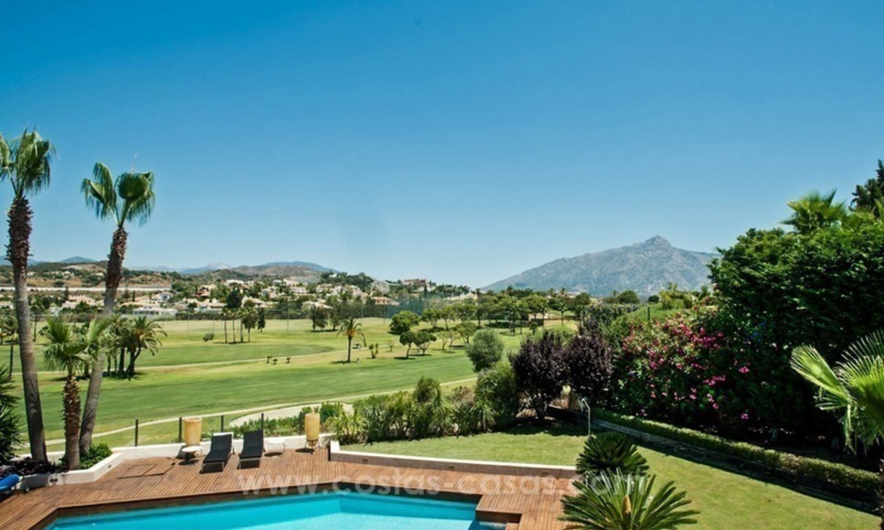 Contemporary refurbished frontline golf villa for sale in Nueva Andalucía, Marbella 1