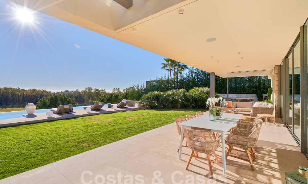 Ready to move in. Modern villa for sale, frontline golf in Benahavis - Marbella 58504