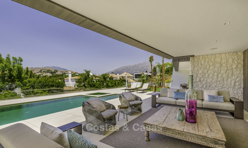 Impressive contemporary style luxury villa for sale in Nueva Andalucía, Marbella. Ready to move in and quality furnished. 15334