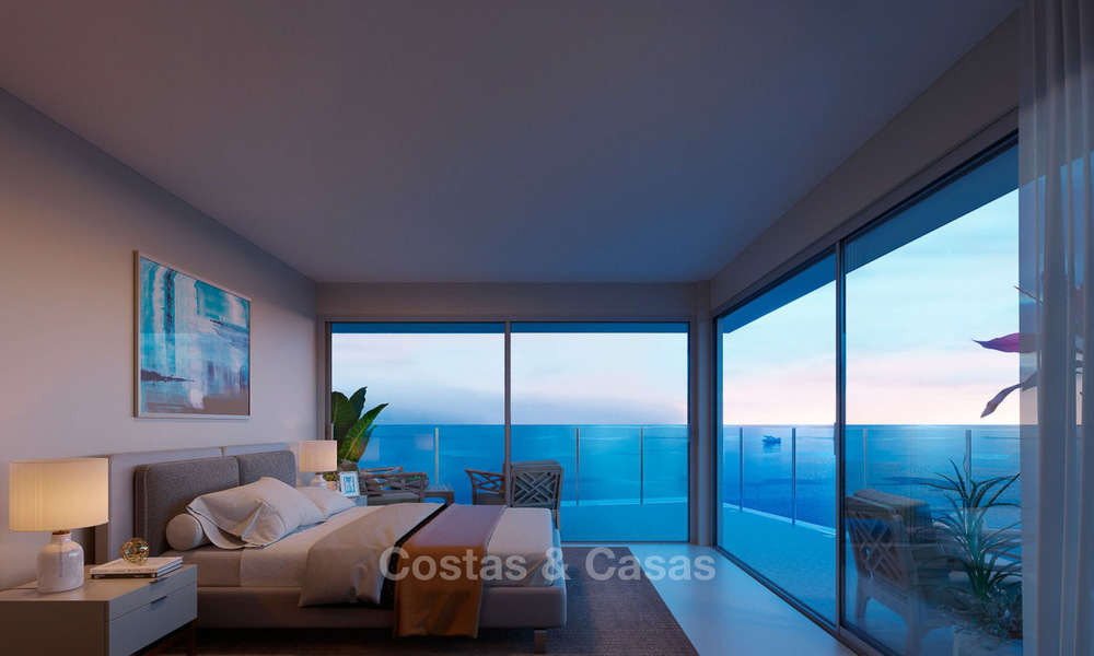 Stunning new contemporary-style townhouses with sea views for sale, in a prestigious resort - Mijas Costa, Costa del Sol 7620