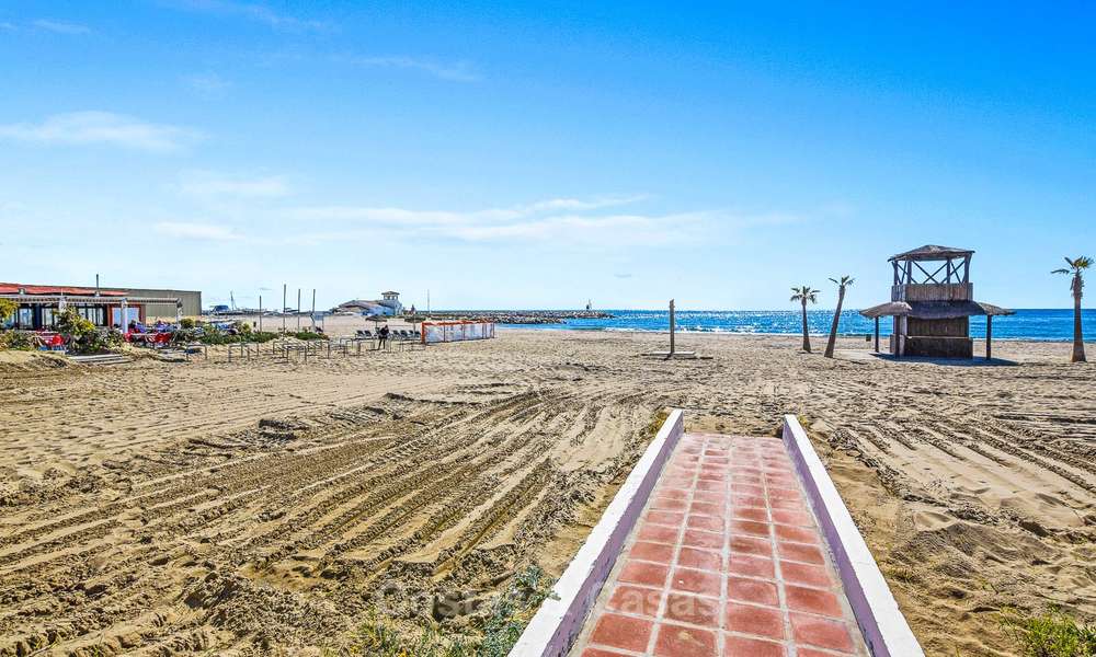 Charming, very spacious duplex ground floor apartment for sale, frontline beach and marina in Cabopino, East Marbella 10268