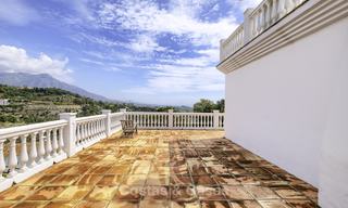 Charming traditional style villa with sea and mountain views for sale in El Madroñal, Benahavis, Marbella 12609 