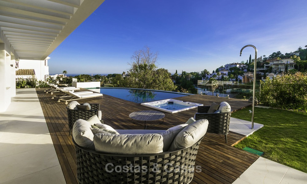 Brand new modern luxury villa with golf and sea views for sale, ready to move into, in a posh golf resort in Nueva Andalucia, Marbella - Benahavis 13277