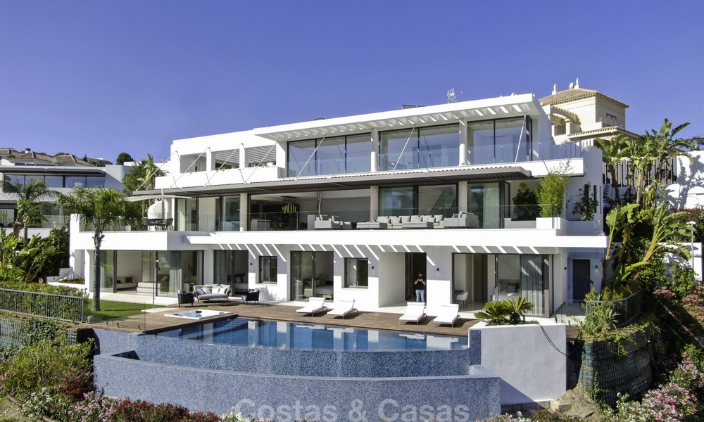 Brand new modern luxury villa with golf and sea views for sale, ready to move into, in a posh golf resort in Nueva Andalucia, Marbella - Benahavis 13311