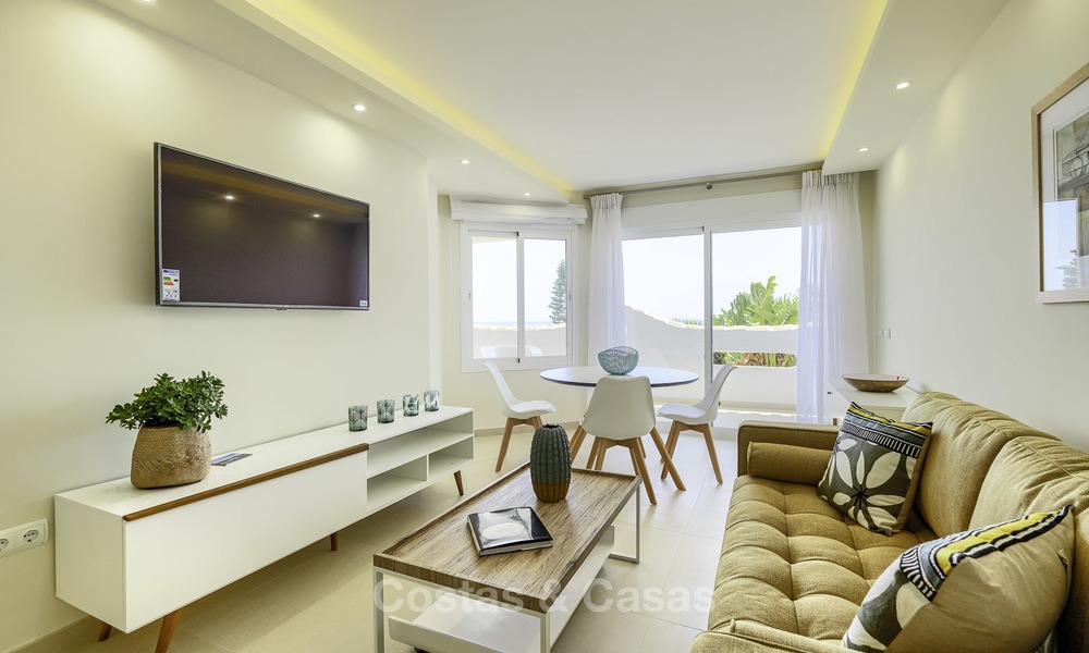 Fully renovated beachfront apartment with panoramic sea views for sale, Mijas Costa 14657