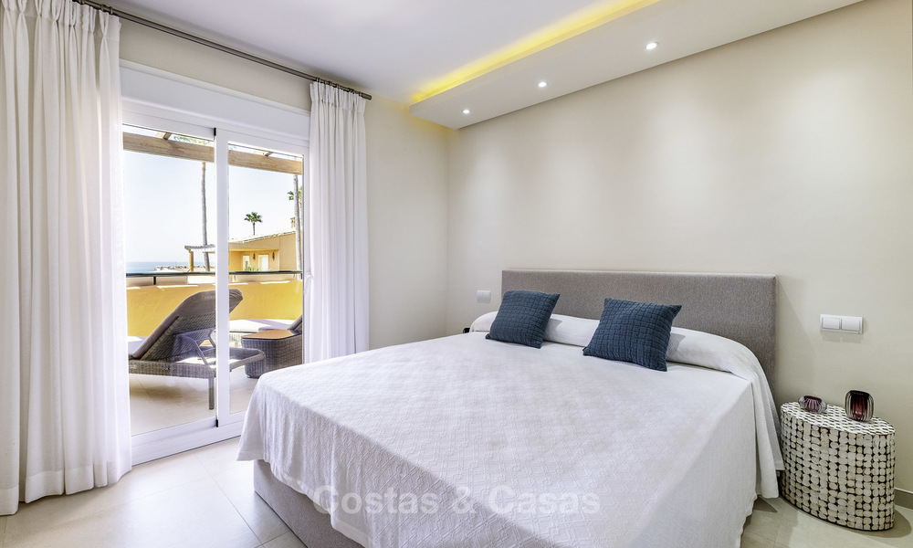 Spacious, fully renovated beachfront townhouse for sale in Estepona. Direct access to the beach and the beach promenade via the communal gardens. 15159