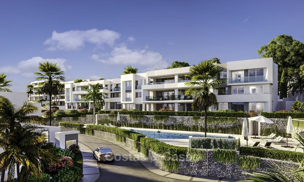 New deluxe contemporary townhouses for sale, front line golf, with stunning sea and golf views, East Marbella 16725