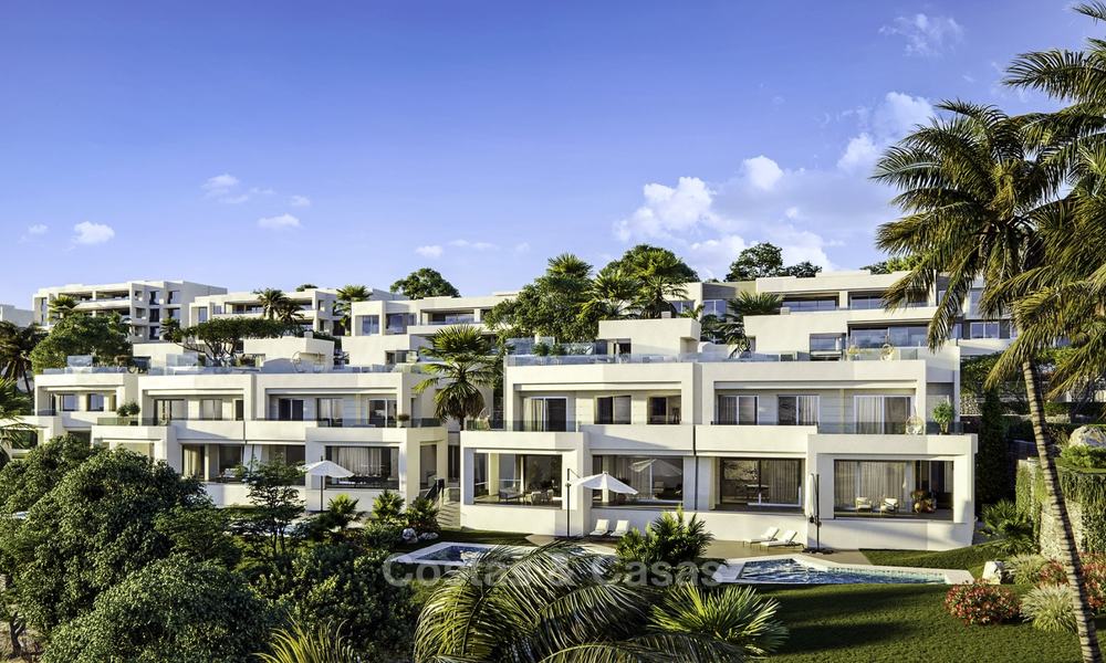 New deluxe contemporary townhouses for sale, front line golf, with stunning sea and golf views, East Marbella 16739