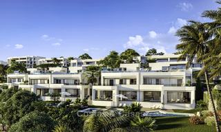 New deluxe contemporary townhouses for sale, front line golf, with stunning sea and golf views, East Marbella 16739 