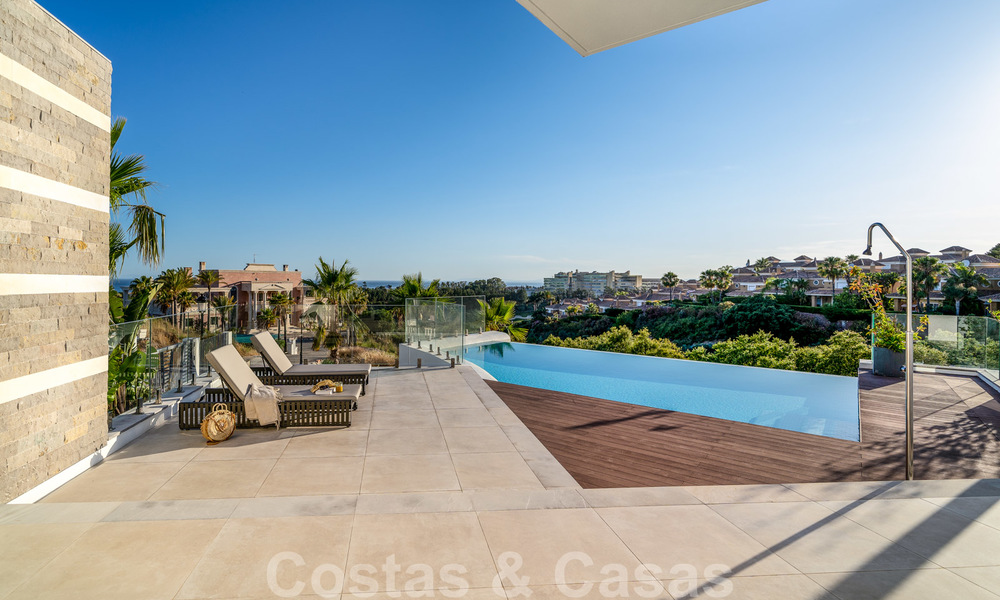 New contemporary designer villa for sale, ready to move into, with sea, golf and mountain views, East Marbella 26771