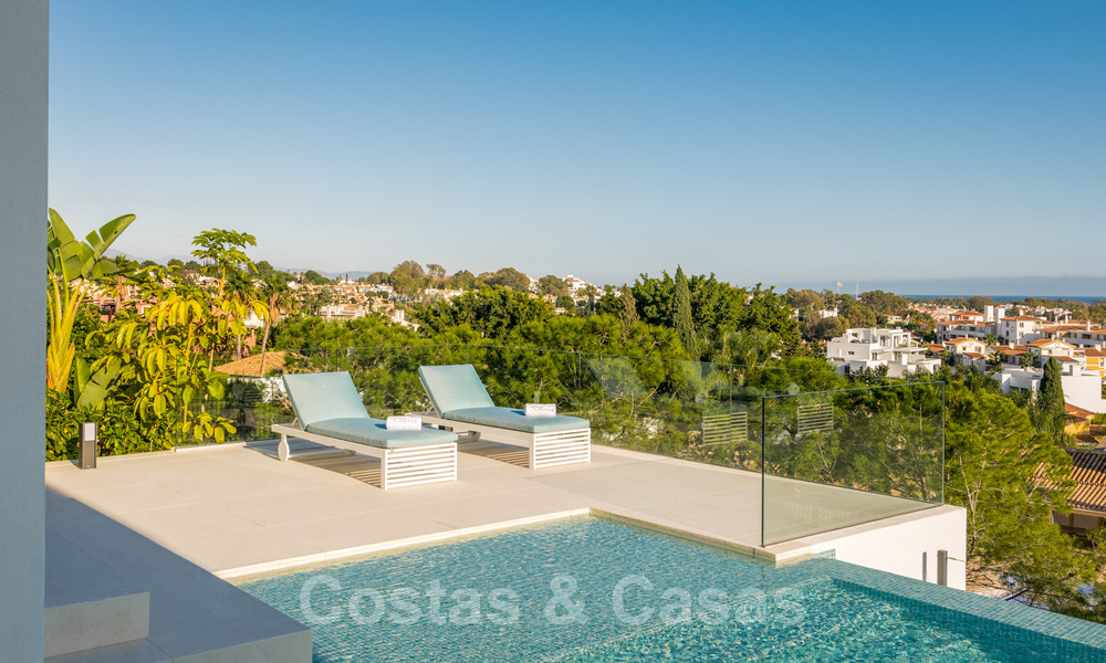 SOLD. Super luxurious contemporary villa with sea and mountain views for sale in the Golden Triangle of Benahavis, Estepona, Marbella 29792