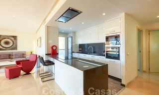 Contemporary garden corner apartment for sale in a residential development with private lagoon, Casares, Costa del Sol 23607 