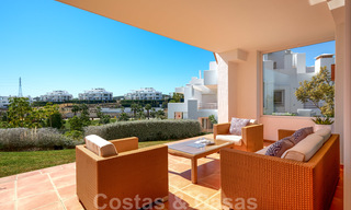 Contemporary garden corner apartment for sale in a residential development with private lagoon, Casares, Costa del Sol 23613 