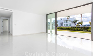 Modern design apartment for sale with spacious terrace and large garden, adjacent to the golf course in Marbella - Estepona 25394 
