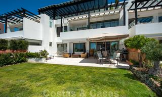 Modern front-line golf apartment with beautiful golf and sea views for sale in Los Flamingos Golf in Marbella - Benahavis 25124 