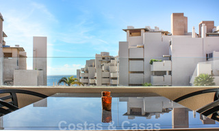 Modern apartment for sale in a frontline beach complex with sea views between Marbella and Estepona 25614 