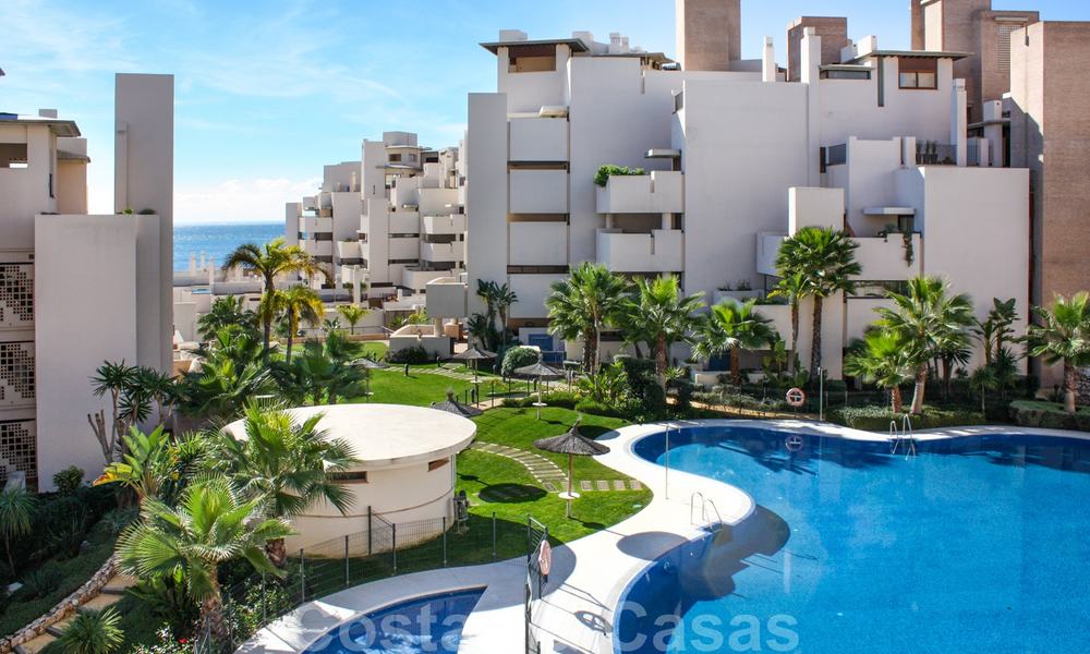 Modern apartment for sale in a frontline beach complex with sea views between Marbella and Estepona 25615