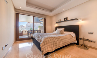 Modern apartment for sale in a frontline beach complex with sea views between Marbella and Estepona 25631 