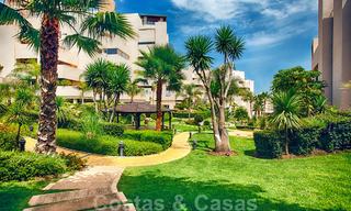 Modern apartment for sale in a first line beach complex with private pool between Marbella and Estepona. Huge price drop! 25690 