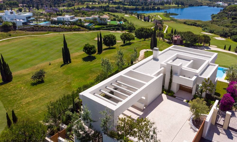 First line golf villa in elegant modern style with panoramic golf and sea views for sale in Los Flamingos Golf in Marbella - Benahavis 26120