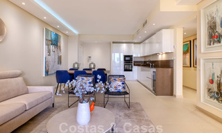 Luxury apartment for sale with open garden and sea views in a first line beach complex, on the New Golden Mile between Marbella and Estepona 26852 