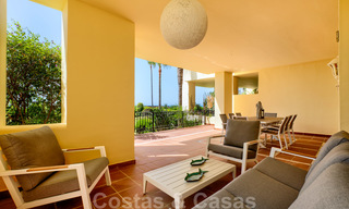 Luxury apartment for sale with open garden and sea views in a first line beach complex, on the New Golden Mile between Marbella and Estepona 26872 