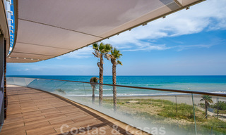Spectacular modern luxury frontline beach apartments for sale in Estepona, Costa del Sol. Ready to move in. 27828 