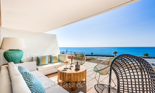 Spectacular modern luxury frontline beach apartments for sale in Estepona, Costa del Sol. Ready to move in. 27837 