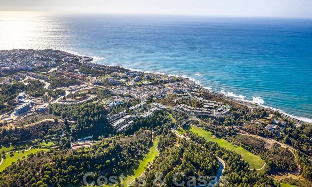 Stunning new avant-garde design terrace houses with sea views for sale in a prestigious golf resort in Mijas Costa, Costa del Sol 32661