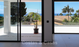 Move in ready, renovated contemporary beachside villa with panoramic sea views for sale in East Marbella 32774 
