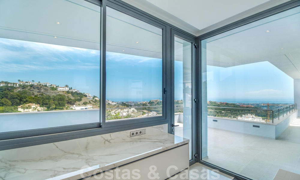 Exclusive and high-tech modern style villa with panoramic sea views for sale, in a prestigious urbanization in Benahavis - Marbella. Completed. 34402