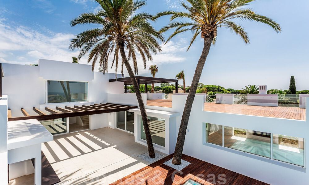 Modern beachside villa for sale in East Marbella with sea views, a stone's throw away from beautiful and cozy beaches 36451