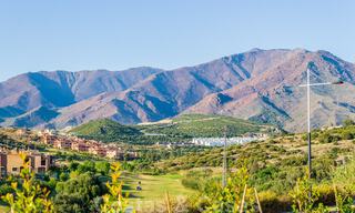 New development with luxury apartments for sale offering panoramic views to the sea and a golf course in Estepona 37439 