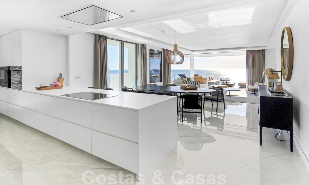 Ready to move in, modern, ultra-luxury apartment for sale, frontline beach, with open sea views, between Marbella and Estepona 38420