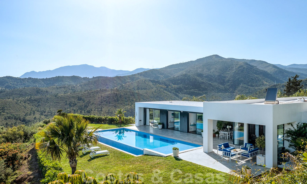 Ready to move in, modern luxury villa for sale with panoramic mountain and sea views in a gated resort in Marbella - Benahavis 41060