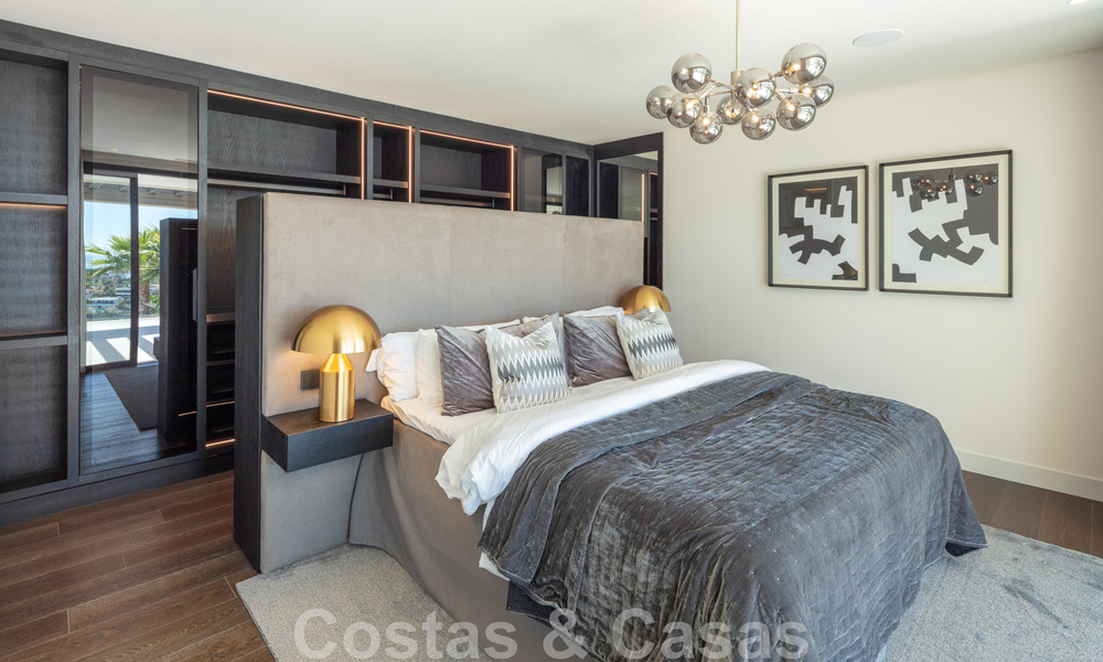 Luxury contemporary style villa for sale with sea views in Nueva Andalucia's golf valley in Marbella 43300