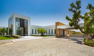 Phenomenal contemporary luxury villa for sale, directly next to the golf course with sea views in a gated golf resort in Marbella - Benahavis 43972 