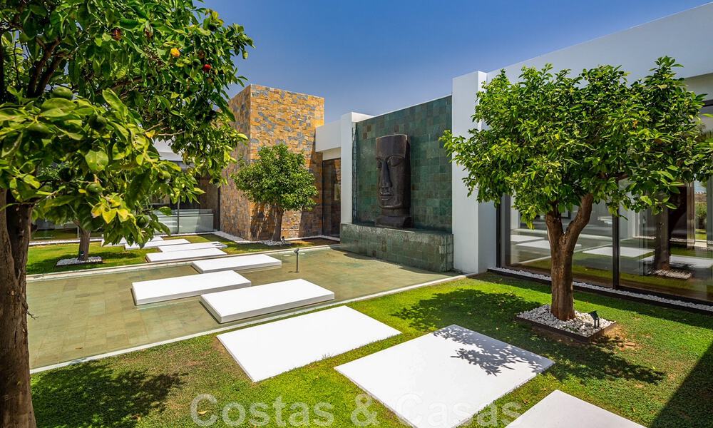 Phenomenal contemporary luxury villa for sale, directly next to the golf course with sea views in a gated golf resort in Marbella - Benahavis 43988
