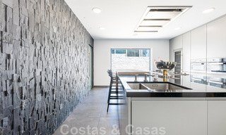 Avant-garde beach villa in a sleek modern style for sale, frontline beach in Mijas Costa, Costa del Sol 44422 