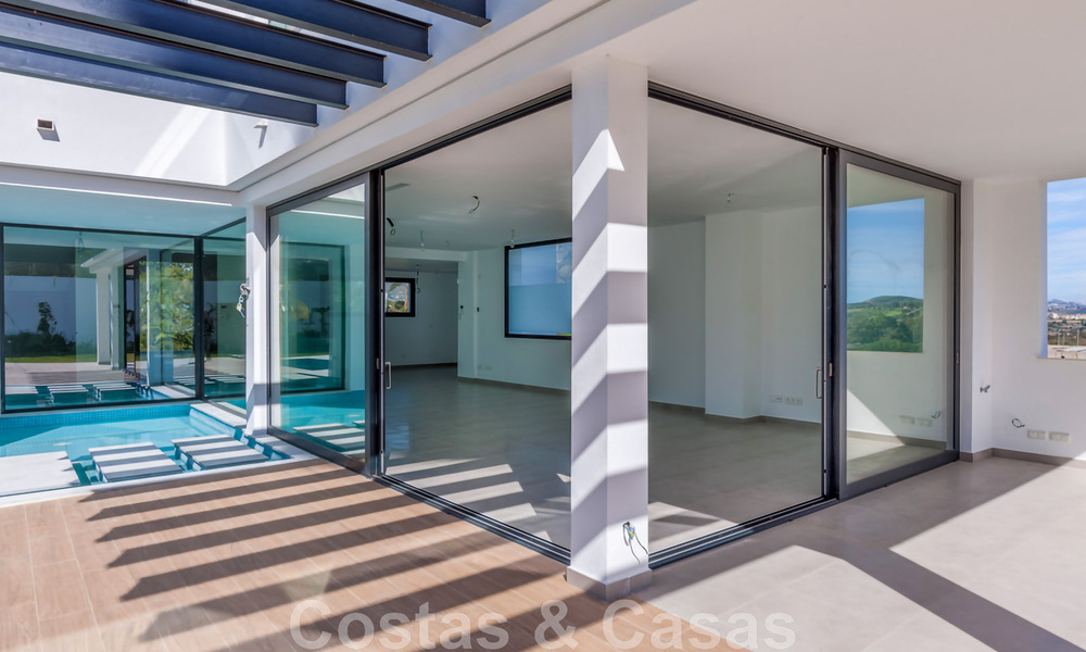 New, contemporary villa for sale with open views to the golf courses of the coveted golf resort La Cala Golf, Mijas 44654