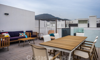 Move-in ready, modern townhouse with sea views for sale, right on the beach, a few minutes' walk from Estepona town 45410 